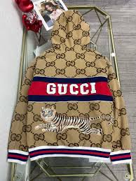 GG Supreme hooded jacket with a tiger print