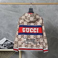 GG Supreme hooded jacket with a tiger print